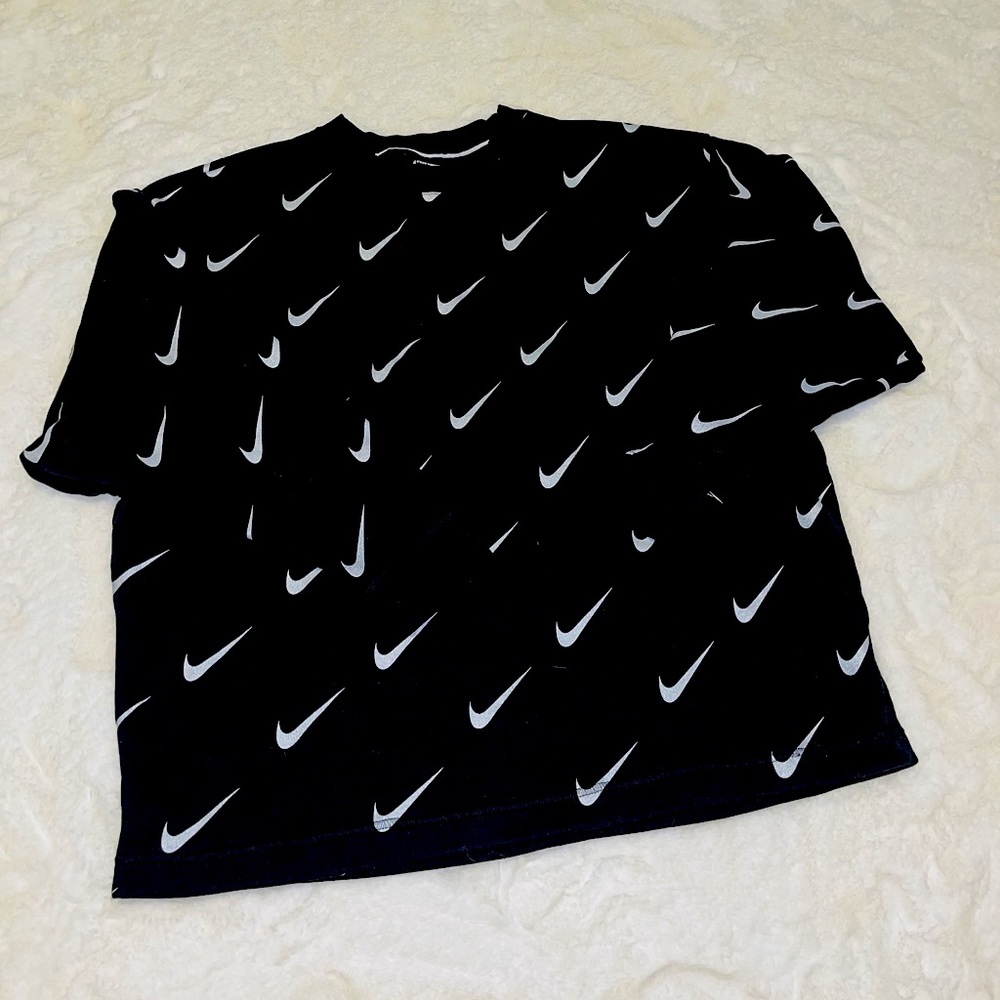 NIKE ALL OVER SWOOSH CREWNECK